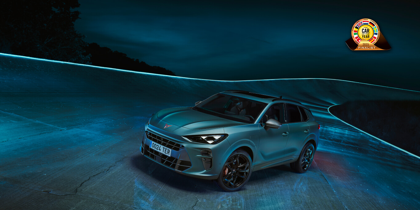 The cupra terramar, a compact suv design and one of the seven finalists for the car of the year 2025 event at the brussels international motor show, displayed under blue lighting.