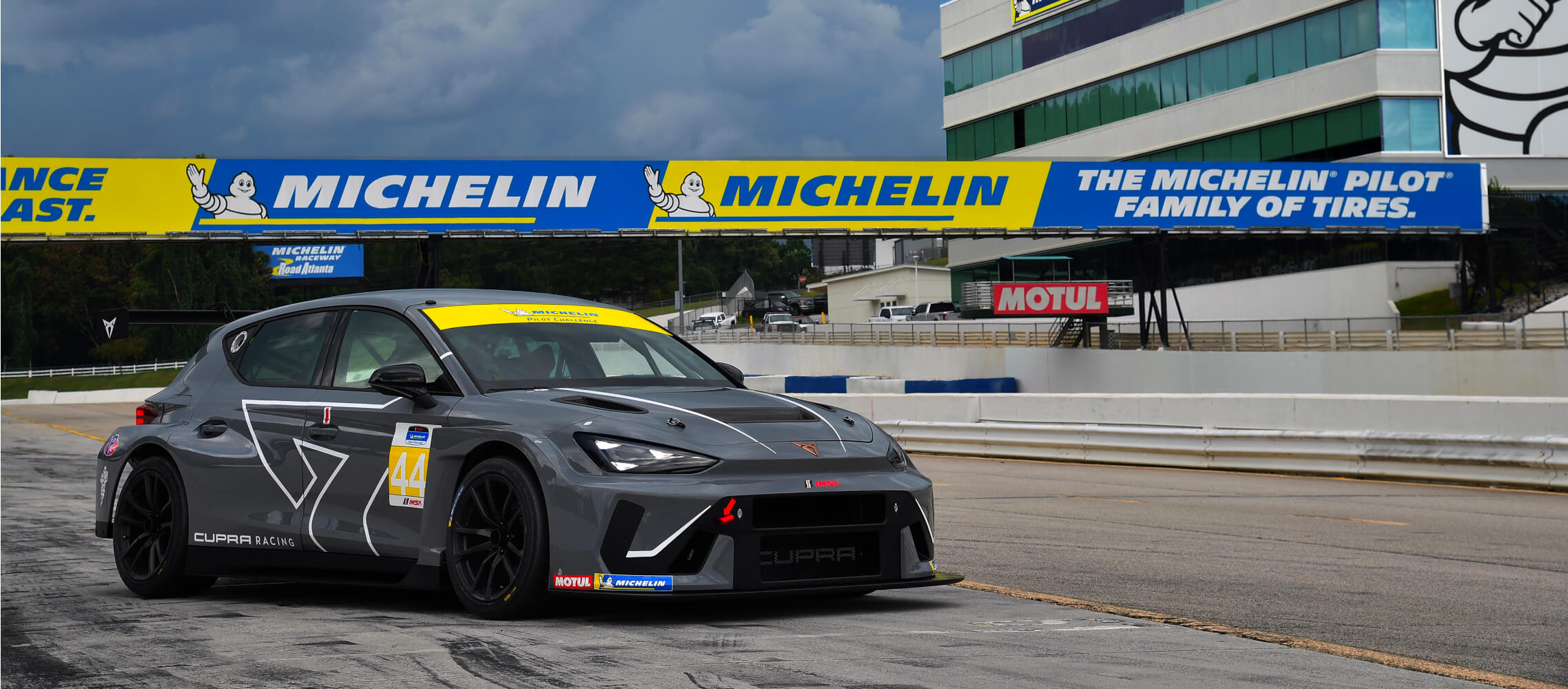 the cupra leon vz tcr on track during the imsa michelin pilot challenge, showcasing its performance in the tcr class, ready for daytona