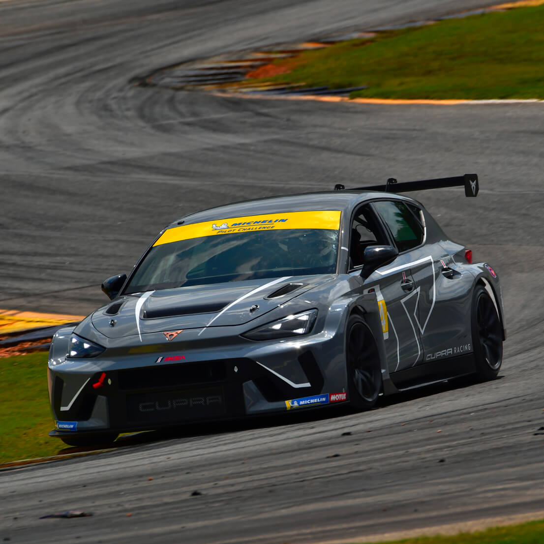 CUPRA Leon VZ tcr drifting on a race track during the IMSA Michelin pilot challenge