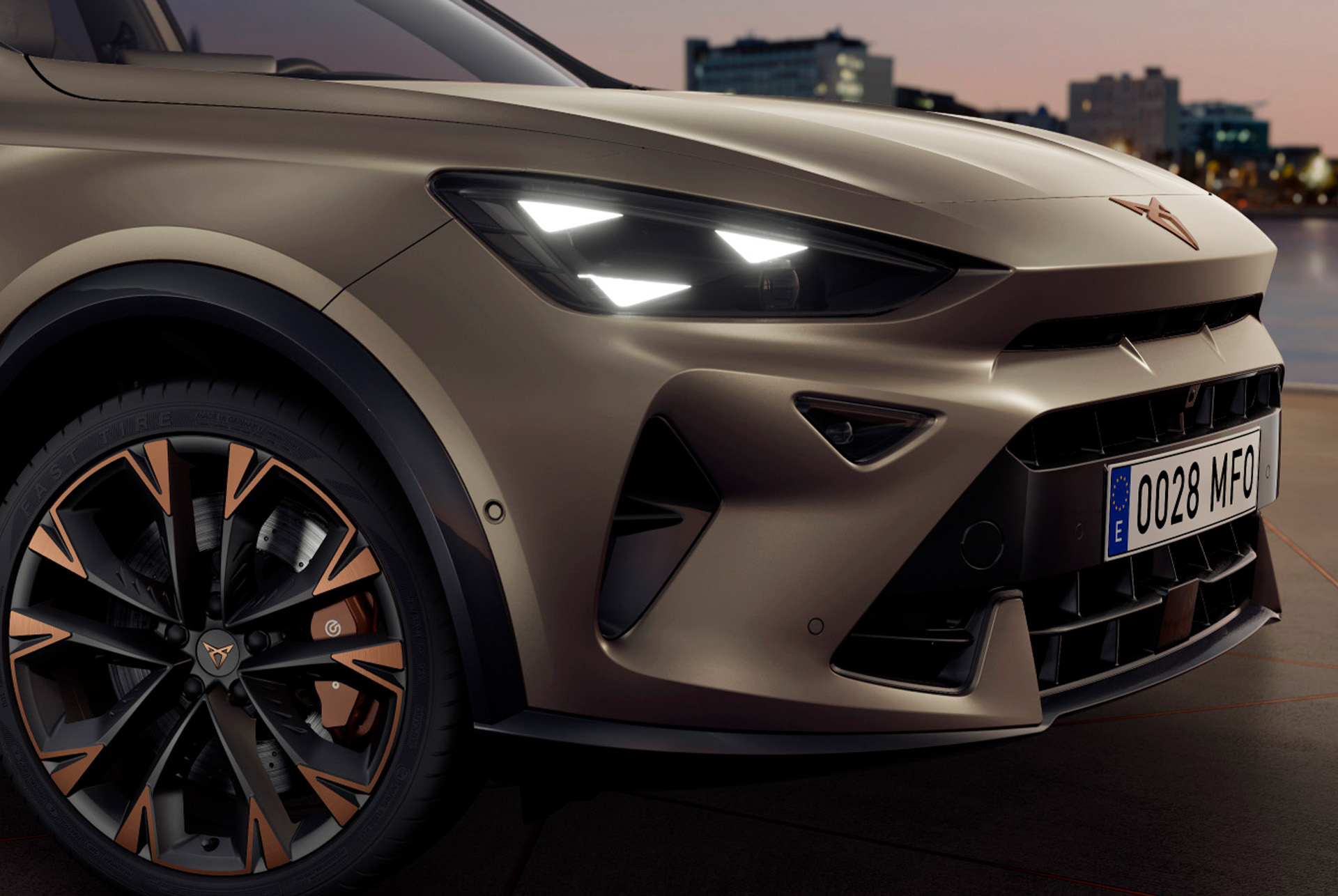 New CUPRA Formentor 2024 in century bronze matt, copper accent wheels, pure performance CUPRA Matrix led lights, headlights with the distinctive triangle eye CUPRA signature.