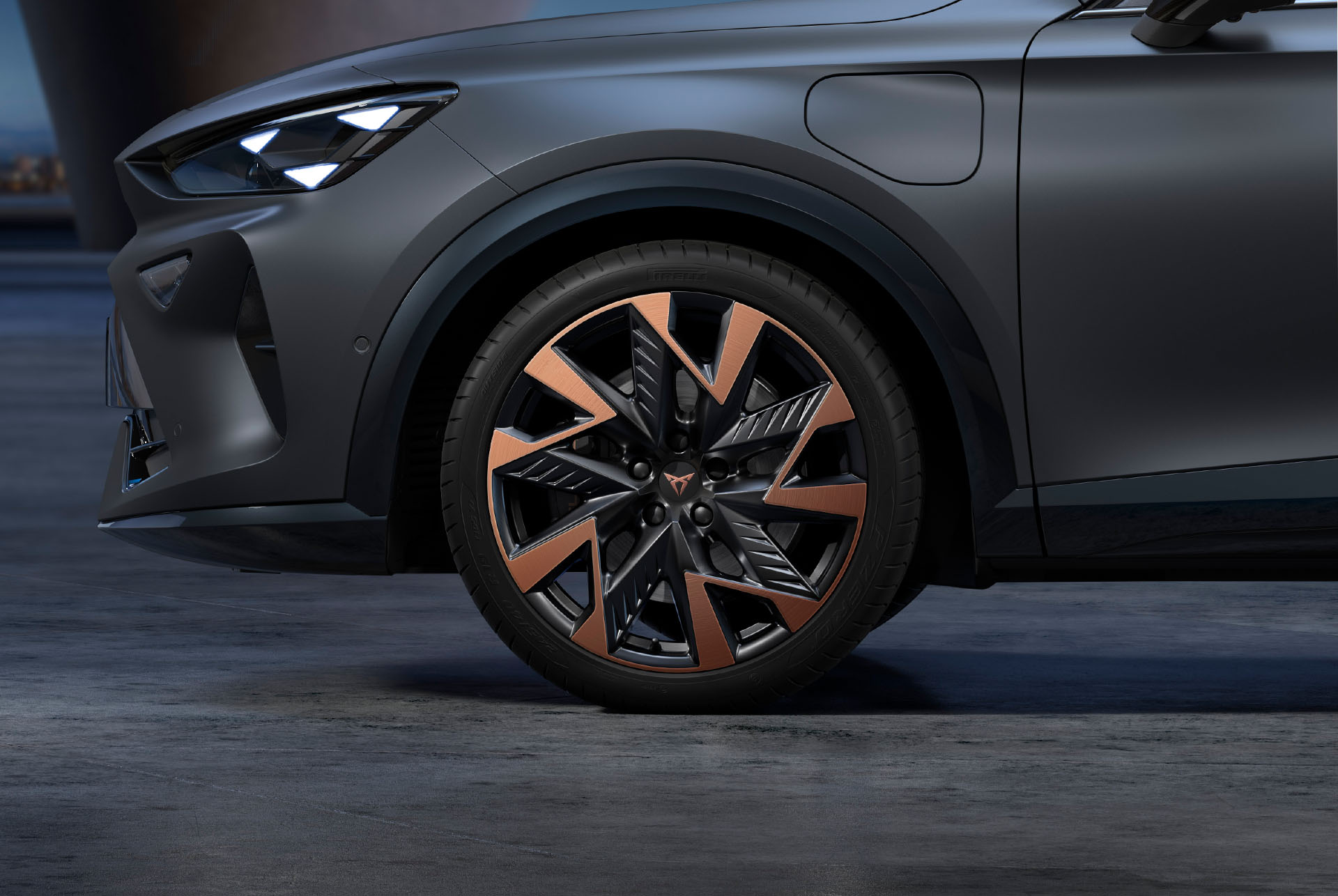 Sandstorm black and copper new CUPRA Formentor 2024 alloy car wheels and tyres with logo in the middle.