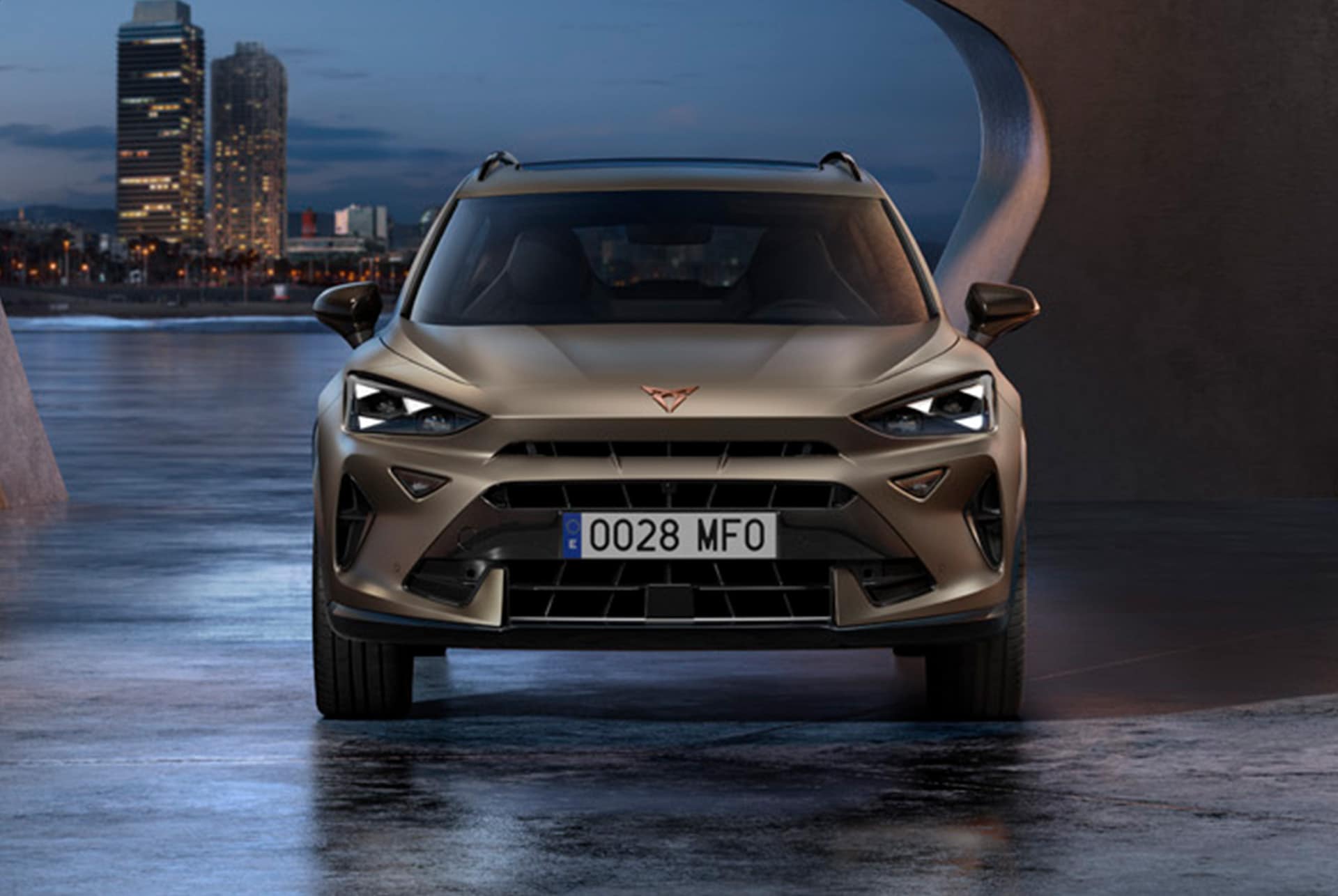 CUPRA Formentor showcasing its sleek and design, set against a night skyline at its back.