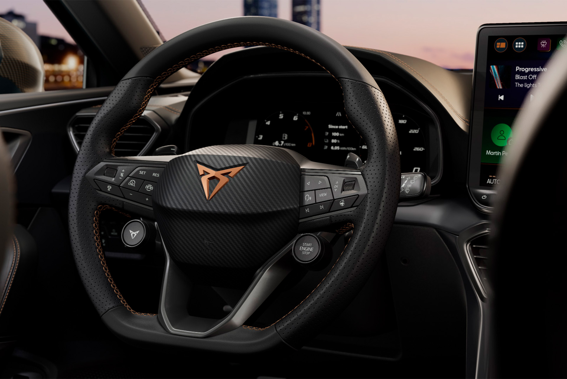 close up of new cupra leon 2024 technology, steering wheel with satelite buttons, car cockpit, drivers seat view, wing mirror, infotainment system, dashboard door panel, cupra logo and window.
