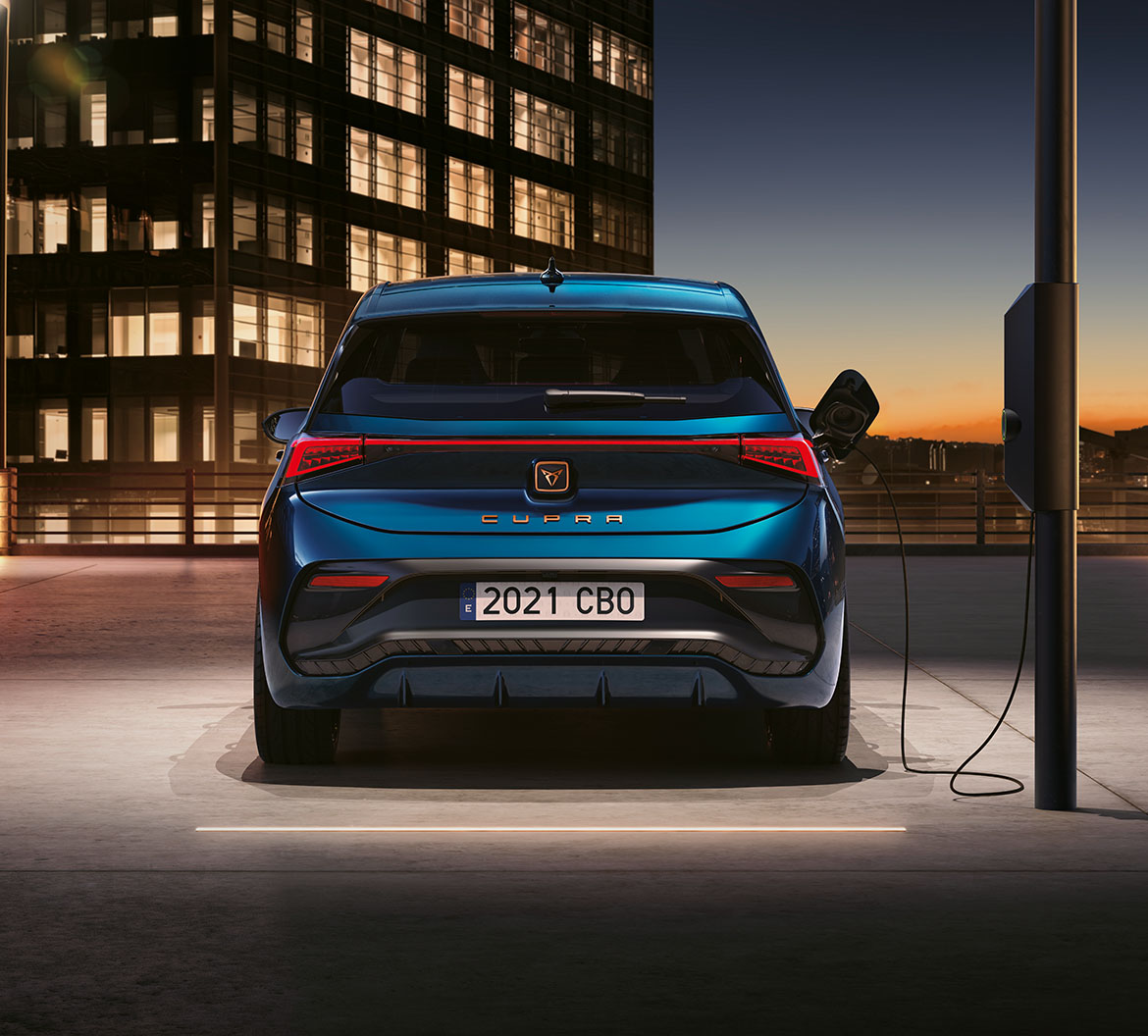 rear view of a cupra electric vehicle charging at a charging point at a city, located with cupra charging station which helps drivers access access ev charge points and view customer reviews